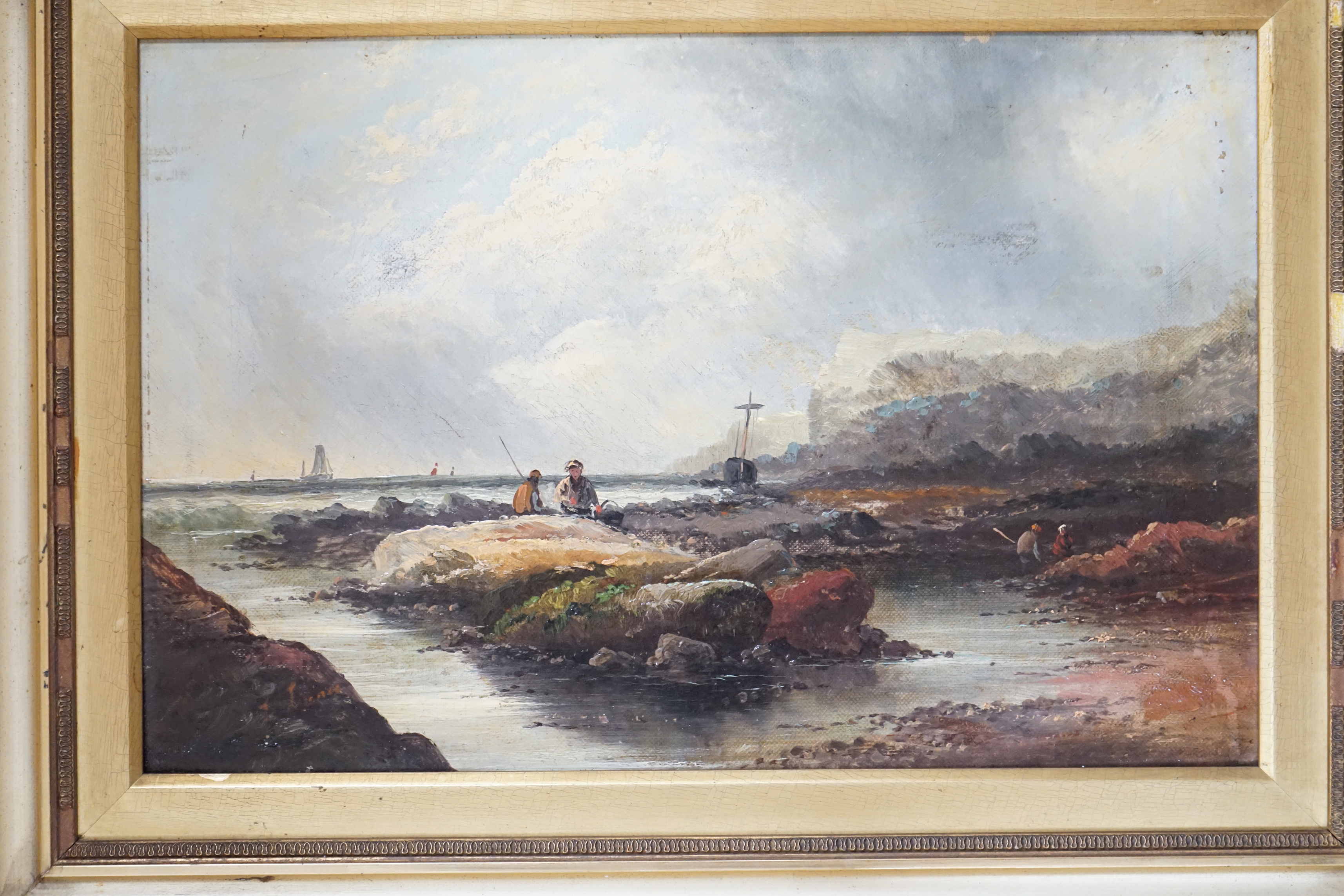 Late 19th/early 20th century school, oil on canvas, Coastal scene with figures collecting shellfish, unsigned, 29 x 44cm